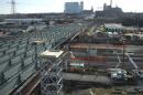 The Feb. 15, 2012 photo shows the progress of construction on the new Grand Ave. viaduct in Midtown. It's expected to open to traffic about a month late because of construction delays.