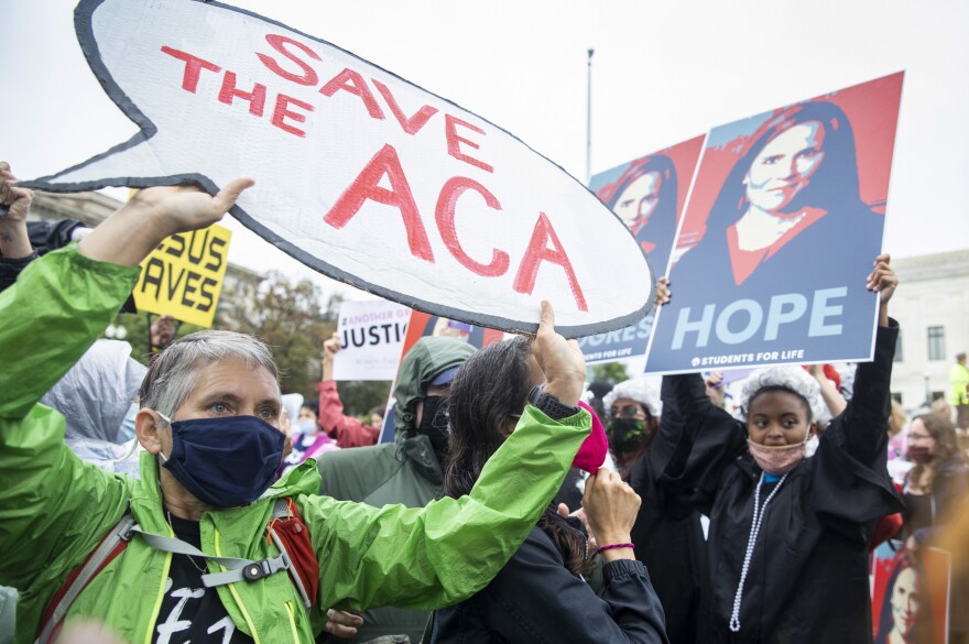 On the first day of Senate hearings over the confirmation of Judge Amy Coney Barrett to the Supreme Court, supporters and opponents of the confirmation confront each other in front of the Supreme Court.