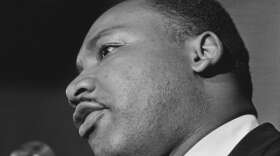 Civil rights activist Martin Luther King Jr. (1929 - 1968) addresses a rally at a church in Birmingham, Alabama, Oct. 14, 1963. (Frank Rockstroh/Michael Ochs Archives/Getty Images)