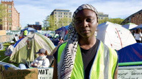 MIT student Safiyyah Ogundipe stands outside the pro-Palestine encampment on the university's campus in Cambridge, Tuesday May 7, 2024