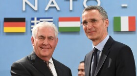 NATO Secretary General Jens Stoltenberg (right) greets Secretary of State Rex Tillerson upon his arrival for a North Atlantic Council (NAC) meeting at the level of Foreign Ministers, at NATO headquarters in Brussels on March 31, 2017. (Emmanuel Dunand/AFP/Getty Images) 