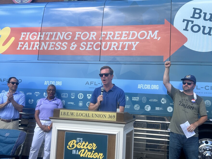 Gov. Andy Beshear spoke at the national bus tour of the AFL-CIO alongside Dustin Reinstedler, president of the Kentucky State AFL-CIO.