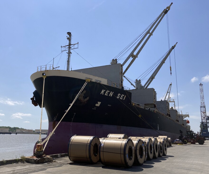 Steel coils sit outside a cargo ship at the Port of Mobile. April 27, 2021.