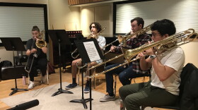 An Interlochen Arts Academy student trombone quartet performs in IPR's Studio A