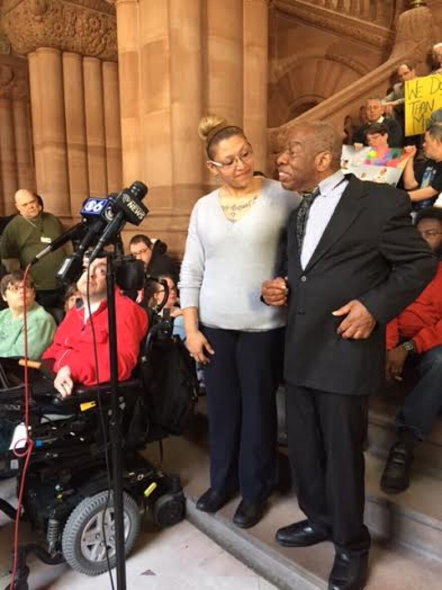 Arthur Mims with his caregiver Tiffany Torres at State Capitol rally Wednesday