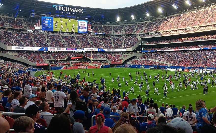 Buffalo Bills players stretch on the field prior to the start of the team's 'Return of the Blue and Red' practice inside Highmark Stadium, Saturday, August 8, 2026.