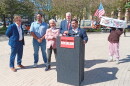 Erie County Republican Committee Chair Michael Kracker speaks in advance of a visit to Buffalo by influential New York City Democrat Alexandria Ocasio-Cortez. Joining him are, from left, Assembly candidate Frank Bogulski, former professional boxer and Democrat Joe Mesi, Erie County Conservative Chair Ralph Lorigo, and Assembly candidate Terry McGuire. A lone protestor showed up during their event.