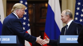 U.S. President Donald Trump shakes hand with Russian President Vladimir Putin at the end of the press conference after their meeting at the Presidential Palace in Helsinki, Finland, Monday, July 16, 2018.