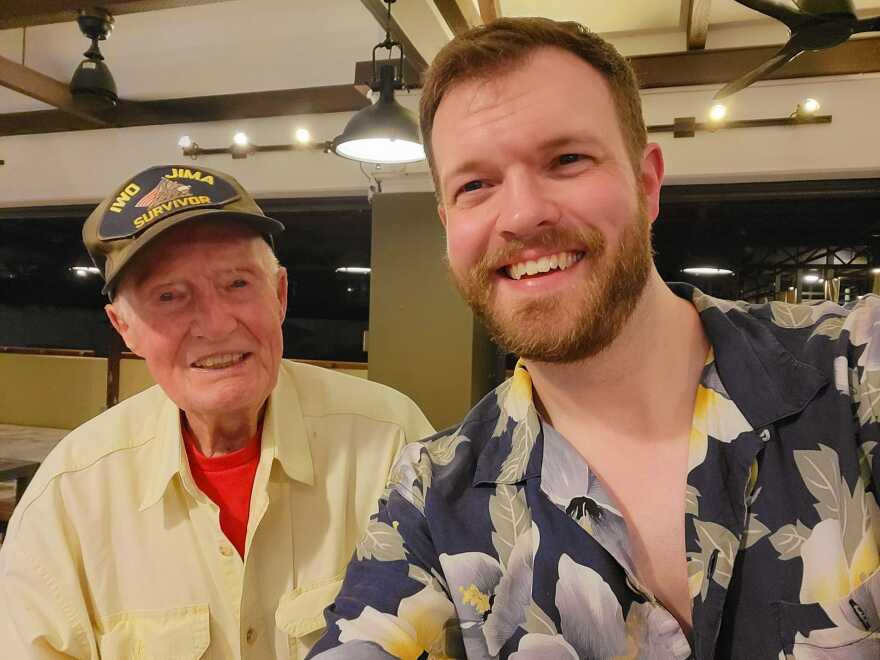 Jared Frederick poses with Nils Mockler, a veteran who survived Iwo Jima. 