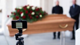 Undertakers rehearsing a live streamed funeral. (Thomas Kronsteiner/Getty Images)