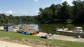Canoes and small boats on the dock of Armco Lake.