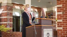 Dr. Deborah Birx spoke outside of the Penn Stater hotel in a mask