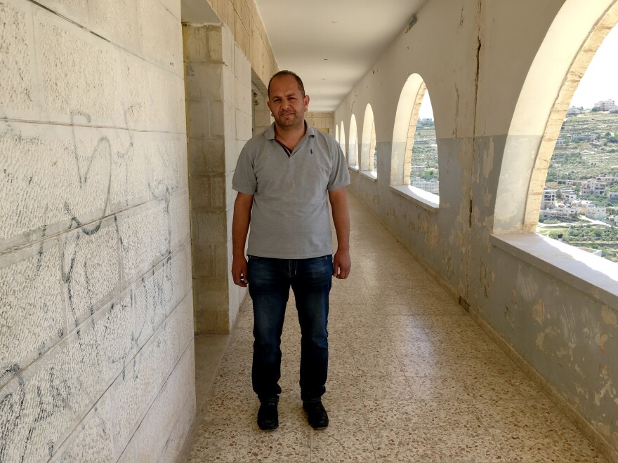Areef Miri is a psychology teacher and counselor at the boys' school in Sair. He has taken the lead in helping students cope and encourages them to vent their feelings.