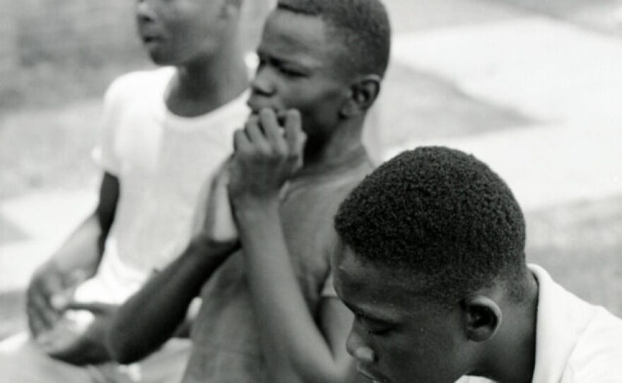 Donald Denard (Center) with two other students outside Morning Star Baptist Church.