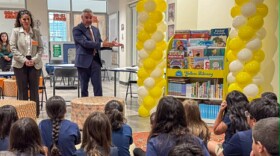Ysleta ISD Superintendent Xavier De La Torre speaks with students at Riverside Elementary School celebrating its Yellow Library, a project of Kendra Scott, November 2025.
