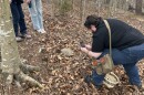 Members of The Blue Ridge Mycological Society attempt to identify a mushroom in early March at Quarry Gardens in Schuyler.