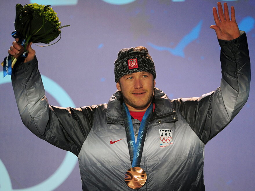 Alpine skier Bode Miller of the United States won a bronze medal in the men's downhill race Monday during the Vancouver Winter Olympics. Miller, who performed poorly at the Torino Games, is approaching these games with a new attitude.