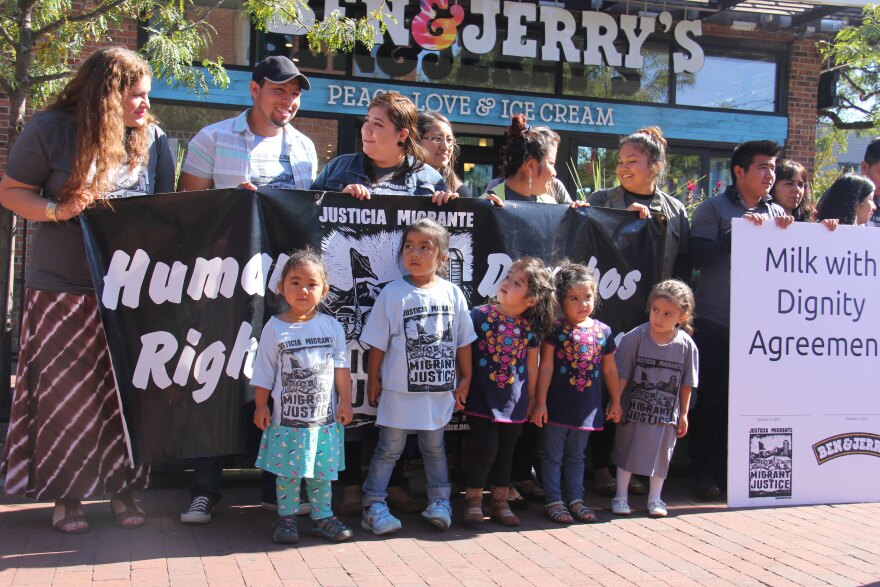 Migrant Justice activists gather to celebrate the signing an agreement with Ben & Jerry's that took two years to negotiate.