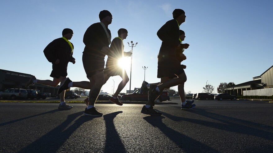 Members of the Pathfinders 5th Battalion, 101st Combat Aviation Brigade of the 101st Airborne Division, go for a run at Fort Campbell, Ky., in 2013. The Census Bureau says it will count deployed service members as residents of their home bases or ports for the 2020 census.