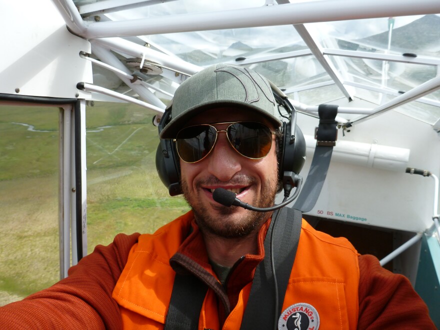 ADF&G Kuskokwim Area Management Biologist Aaron Tiernan flies an aerial king salmon survey over the Arolik River.