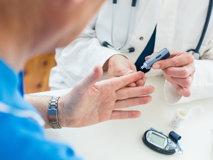  Doctor takes a sample of a patient's blood.