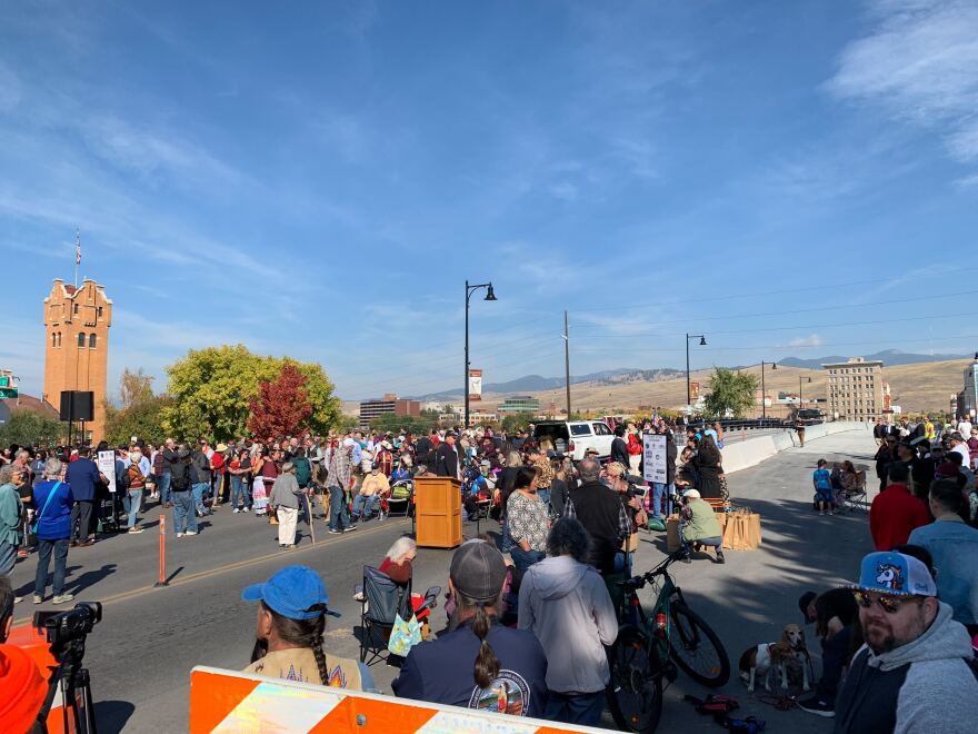 Hundreds of people gather on Indigenous Peoples' Day to dedicate a landmark bridge in Missoula, MT in honor of a Salish tribal leader and his descendants, Oct. 10, 2022.