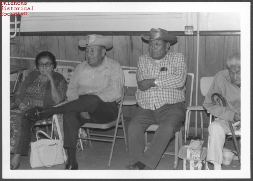 At a memorial for Maude Littlecrow Stoneroad, Red Rock, Oklahoma. Left to right, Lavina Dailey, Truman Dailey, Jiggs Manual Black and unknown.