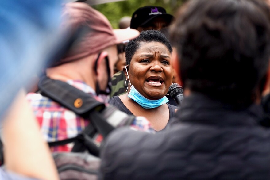 Louisville Urban League president and CEO Sadiqa Reynolds speaks to protesters during a direct action training on Sept. 23, 2020, before a grand jury releases its decision in the Breonna Taylor investigation. 