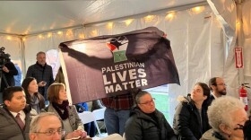 A pro-Palestinian protester interrupted U.S. Rep. Jake Auchincloss during a press conference with Massachusetts Gov. Maura Healey and other administration officials in November 2023.