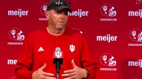 Rod Carey, a former three-year starting center for IU in the early 1990s, was promoted Sunday to replace Ron Hiller, who was fired after the Hoosiers allowed seven sacks in a 31-10 loss to No. 4 Michigan Saturday.