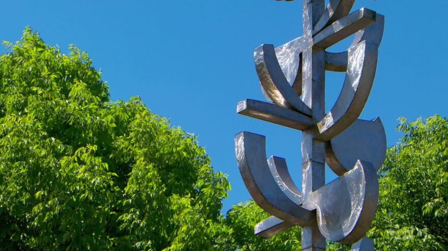 Lee Kelly's stainless steel sculpture shimmers in the sunlight at the Oregon Garden.