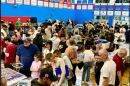 The scene of an earlier card show in a local gym. This weekend's promises at least 250 tables of sports and gaming cards.
