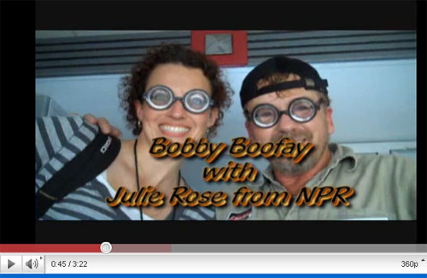 WFAE's Julie Rose with trucker Jim McCarter posing as his alter ego Bobby Boofay.