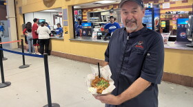 Albuquerque Isotopes head chef Jim Griego is a friendly guy, but he serves up a mean dish of nachos.