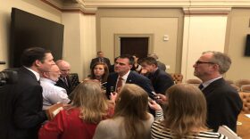 Gov. Kevin Stitt talks with reporters following a Dec. 20 meeting of the state Board of Equalization.