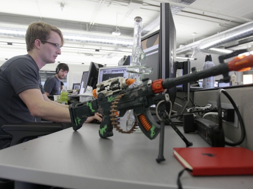 Zynga software engineer and developer Davy Sulock works in the Mafia Wars 2 studio in San Francisco. Zynga is adding ways to play its Web games as it prepares for an initial public offering of stock.