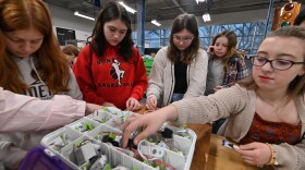 Willow McDonnell, Briana Bodie, Riley Schmidt, Leonora Orellana Anton and Keilee Gumble of the Wayne Highlands School District work with "Little Bits" during Girls on Fire at Johnson College in Scranton.