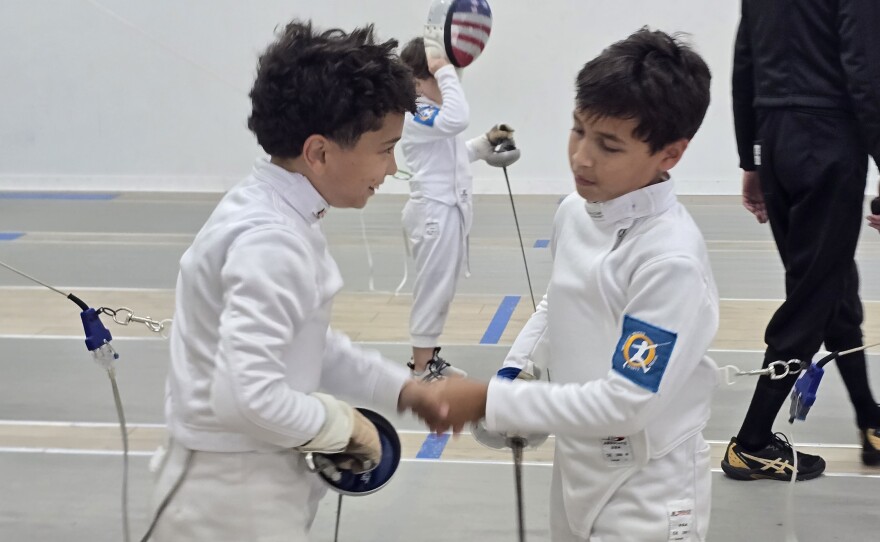 Sportsmanship is a key lesson taught at the Orlando Fencing Sports Center. A fencing bout cannot end until competitors shake hands.