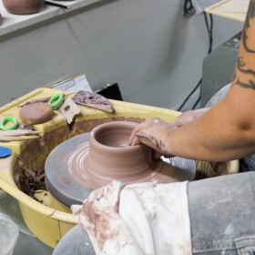 JaiDe Brown leads a cermanics demonstration during a recent class at City Arts in downtown Wichita.