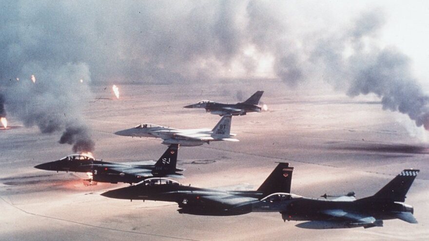 U.S. warplanes fly over burning oil wells in Kuwait during Operation Desert Storm in 1991.