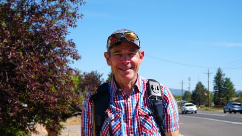 U.S. Sen. John Curtis walks down Kamas' Main Street on Thursday, July 2, as part of his 250-mile walk honoring the 250th anniversary of the United States.