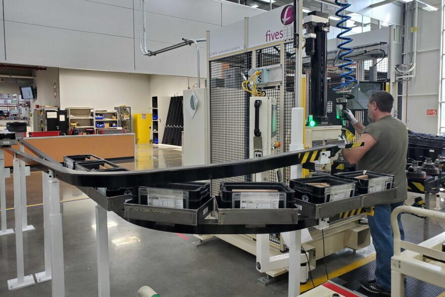 An employee working on one of the production lines at Fiat Chrysler Automobiles Tipton Transmission Plant.