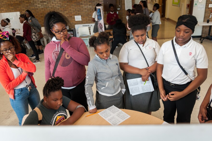 Students at Hawthorn Leadership School for Girls watch classmates' capstone project earlier on May 12, 2017.