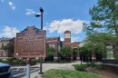 ohio historical marker in front of a brick building with clock tower