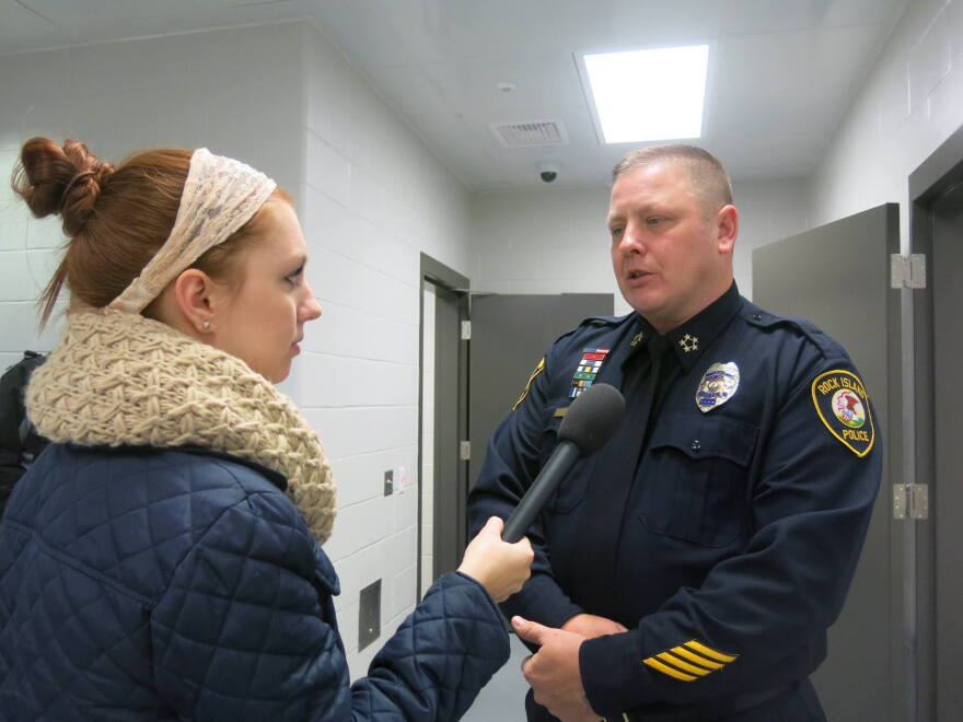 Chief Jeff VenHuizen, talking with former WVIK reporter Chloe Dale, in 2015.