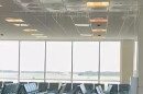 Water cascades from the ceiling in Terminal D at RSW Saturday after a bolt on a chilled water line broke. An airport official said Sunday that the line was quickly fixed and cleanup nearly completed.