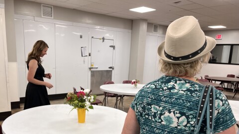 Billings Leadership Foundation executive director Dyann Romeijn (left) leads legislators through the Montana Rescue Mission cafeteria.