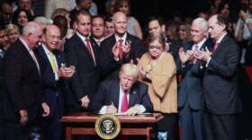 Then President Trump in Miami signing an order to re-tighten sanctions on Cuba in 2017. (Roberto Koltun/Miami Herald)