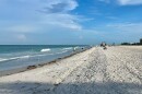 People walking along a beach