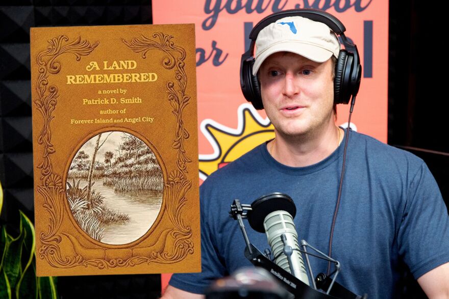 A photo of the brown and white novel with yellow font superimposed over a photo of filmmaker Todd Wiseman Jr. in the WUSF studio speaking into a microphone. 